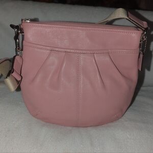 Coach pink leather soho swing pack crossbody bag.